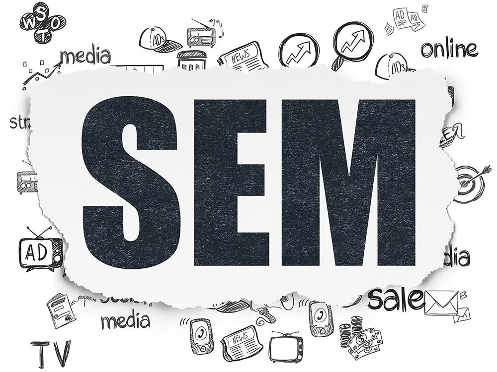 Large letters "SEM" on a torn strip of white paper surrounded by hand-drawn marketing doodles including a TV, newspaper, charts and the word "online"