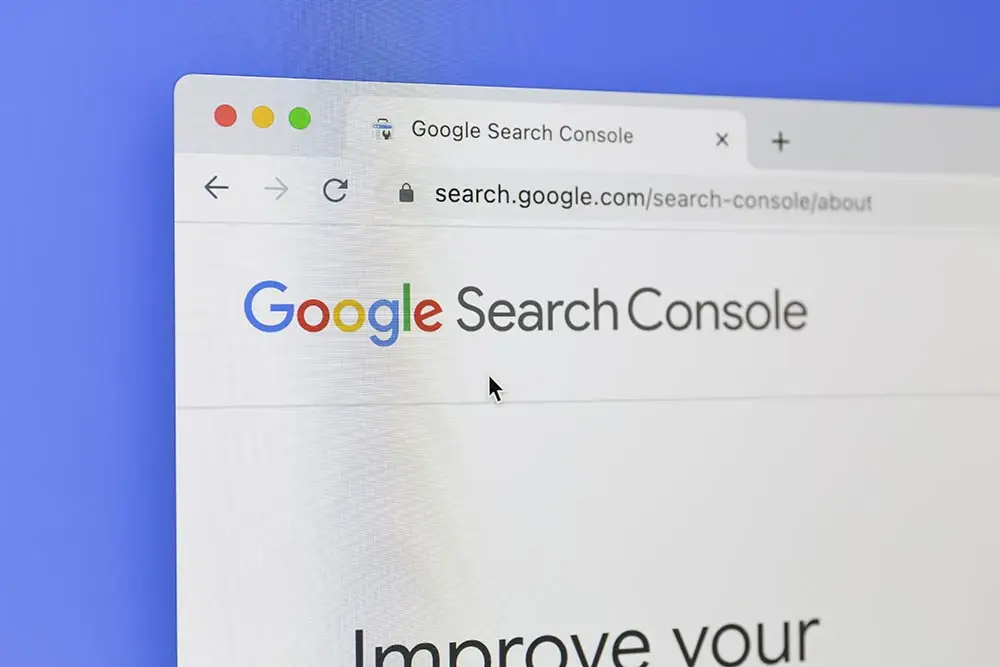 Browser window on a purple background open to search.google.com/search-console/about, showing the Google Search Console logo.