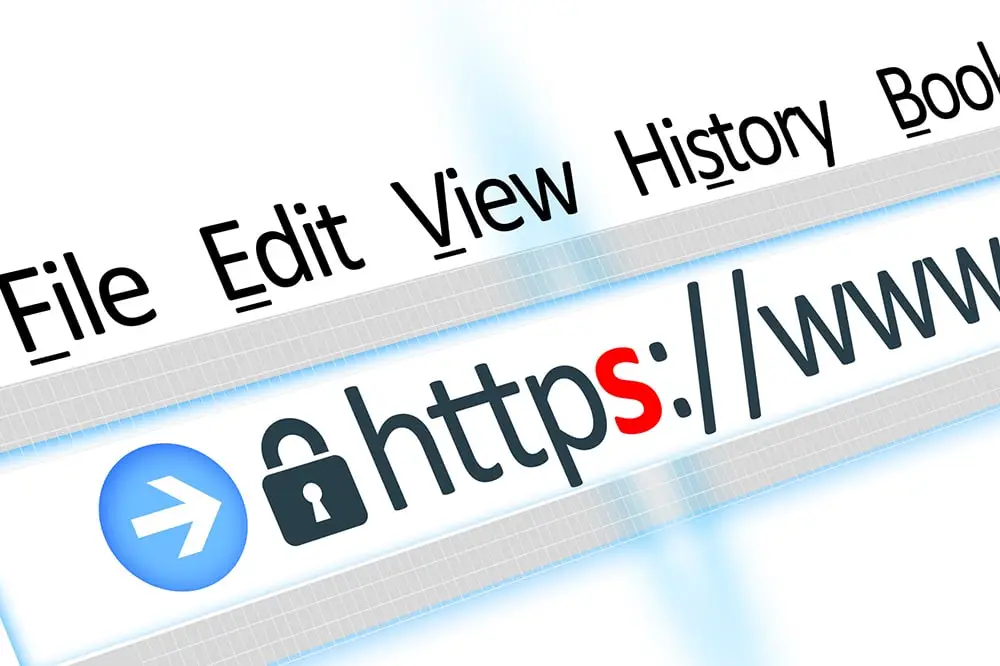 Angled close-up of a browser menu bar and address bar showing a padlock and "https://www" with the letter s highlighted in red